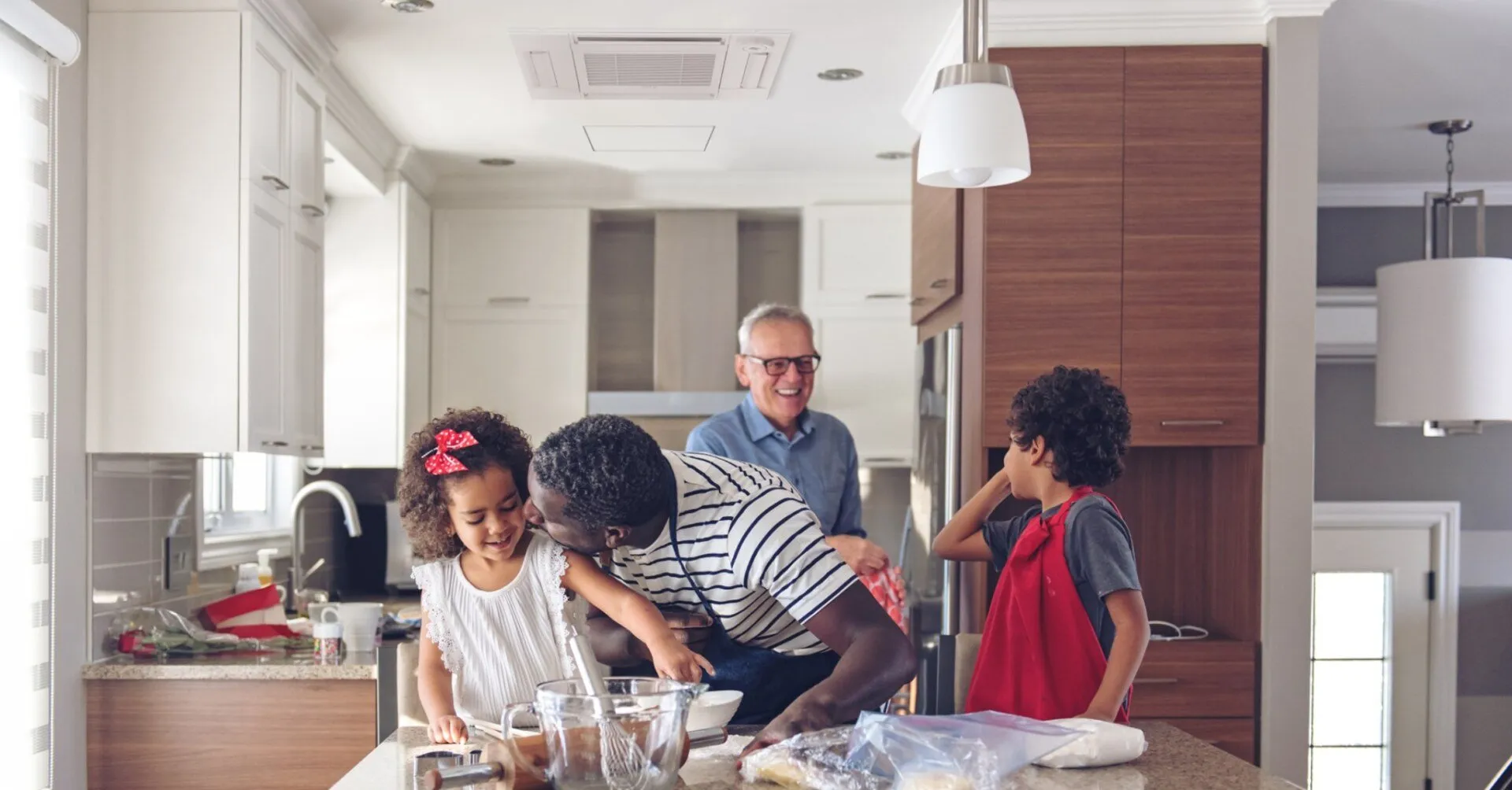 Happy family cooking together in a modern kitchen