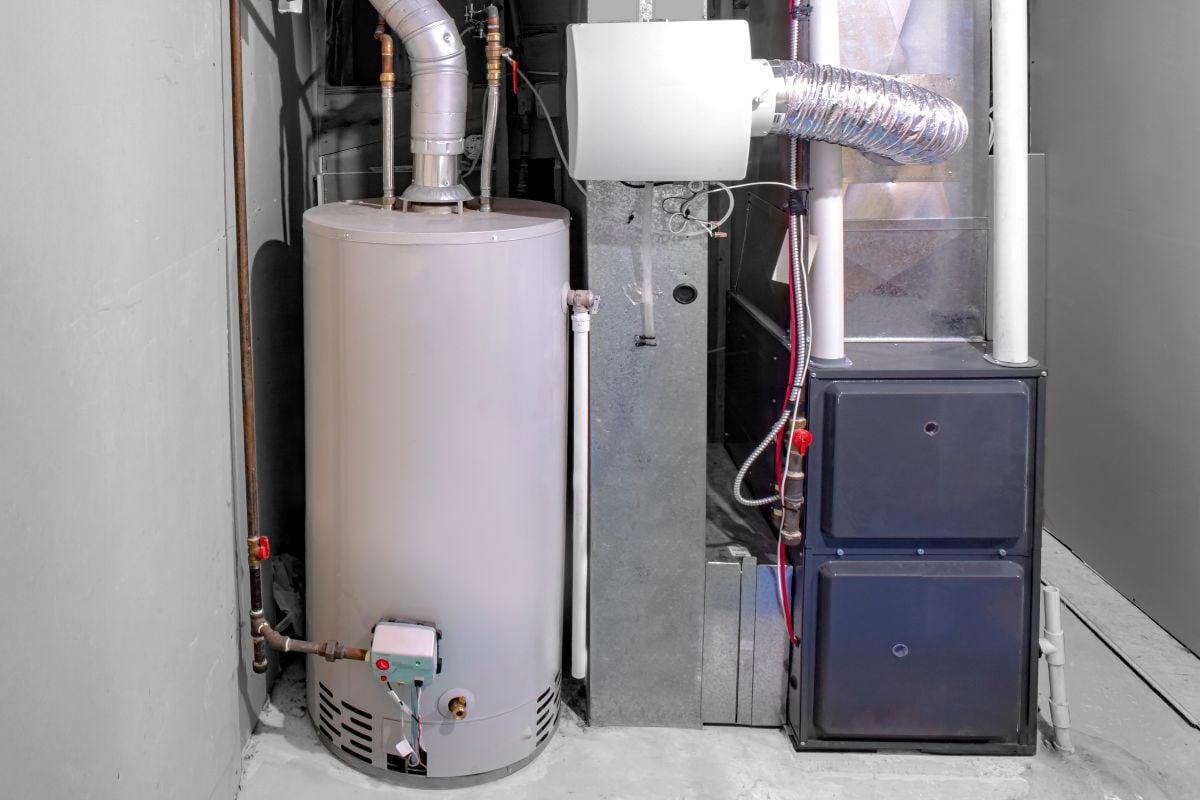 A home high efficiency furnace with a residential gas water heater