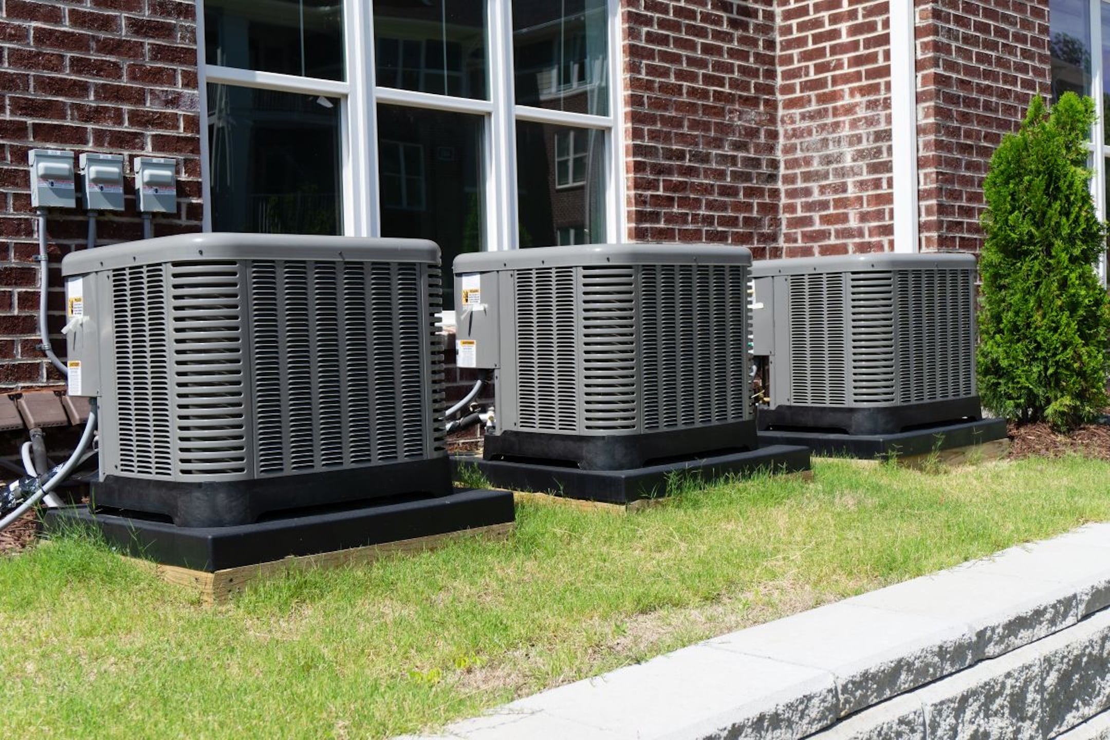 AC-units-attached-to-apartment-building