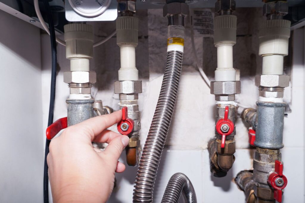 Plumbing connections of a modern domestic double-circuit gas boiler, water heater