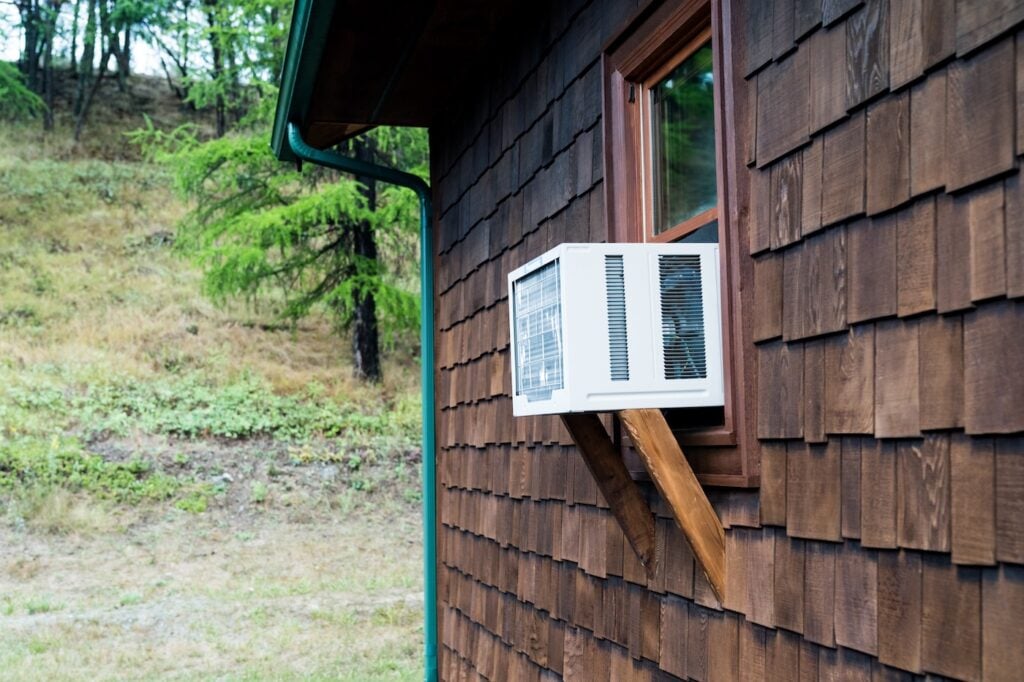 Window air conditioning unit on a cabin