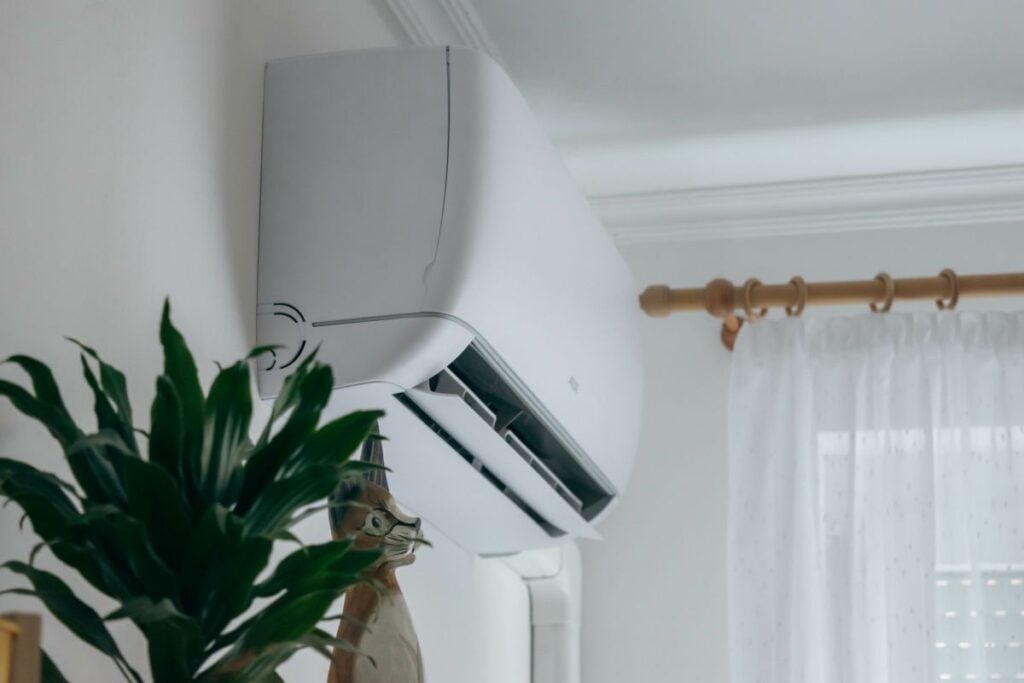 Split air conditioner on a white wall closeup

